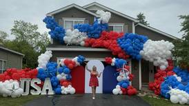 Lake in the Hills home festooned with balloons for the Fourth