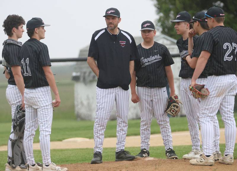 Woodland head baseball coach Dan Essman talks to his team on Tuesday, May 12, 2026 at Woodland High School.