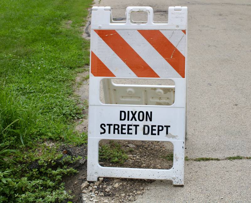 A Dixon Street Department sign.
