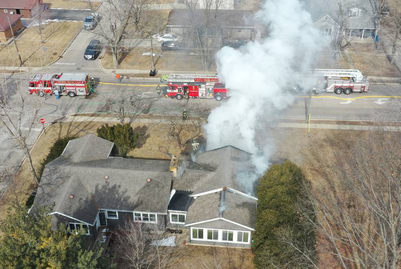 An aerial view of smoke billowing out of a garage as Peru firefighters respond to the scene in the 1900 block of Shooting Park Road on Monday, Feb. 9, 2026 in Peru. La Salle, Peru, Utica, Oglesby and Spring Valley fire departments were dispatched around 12:15p.m. to the fire.
