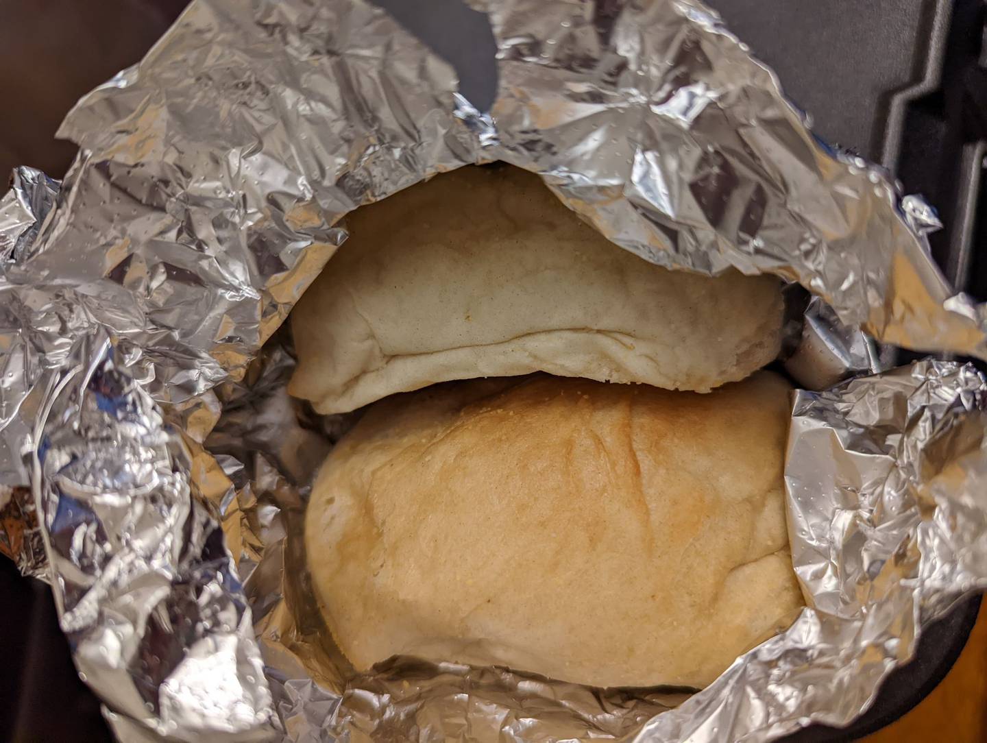 Pictured is a generous side order of bread from Happy Place Cafe is Shorewood.