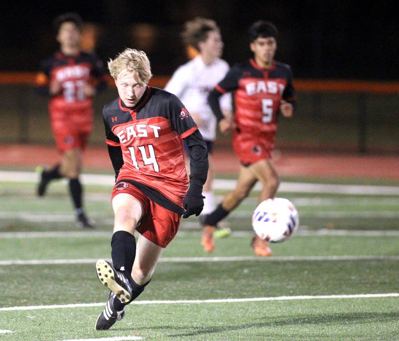 Glenbard East’s Josh Maida kicks the ball during a 3A St. Charles East Sectional semifinal against Conant on Wednesday, Oct. 26, 2022.