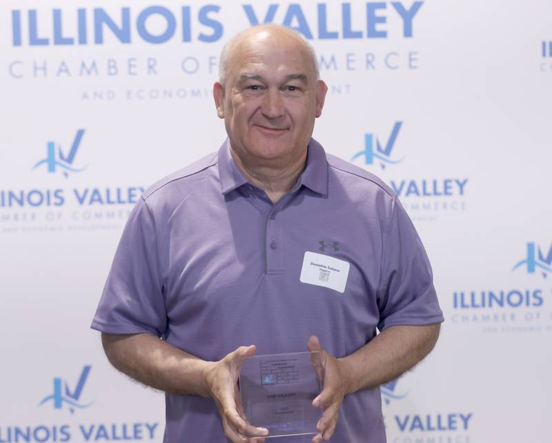 Demetrio Slazar poses with his Cornerstone award during the Illinois Valley Chamber of Champions of Change Awards Night on Wednesday, May 6, 2026 at the Westclox Event Center in Peru.