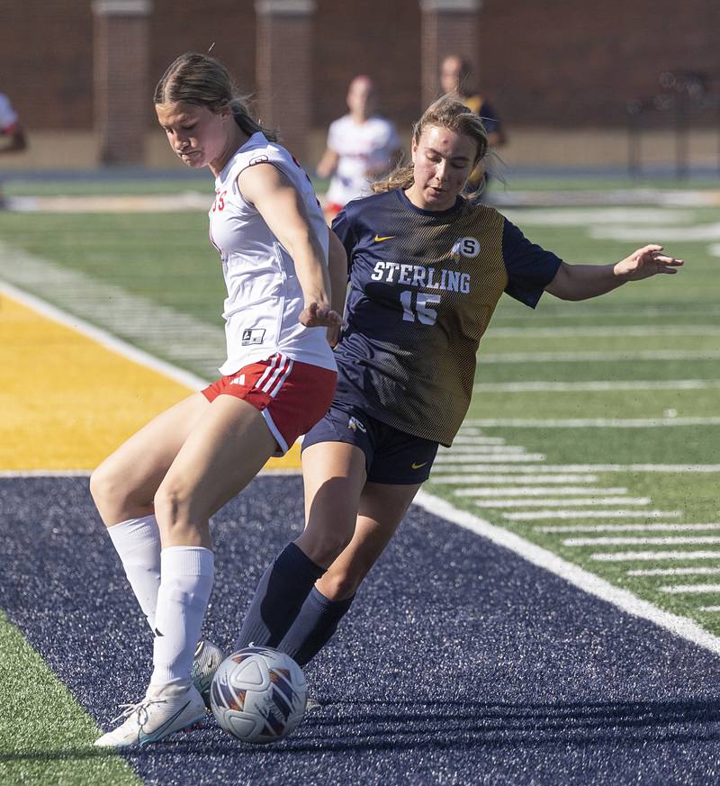Sterling’s Natalie Scarbrough works against Streator’s Rhea Huey Friday, May 15, 2026, during the Class 2A regional soccer quarterfinal.