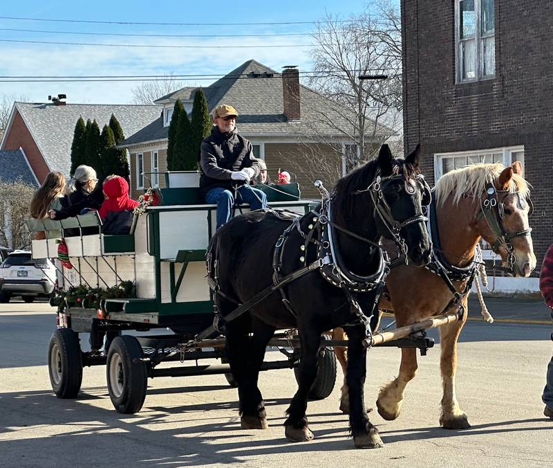 Horse drawn carriage rides were part of the Christmas market event Saturday, Dec. 7, 2024, in Tiskilwa.