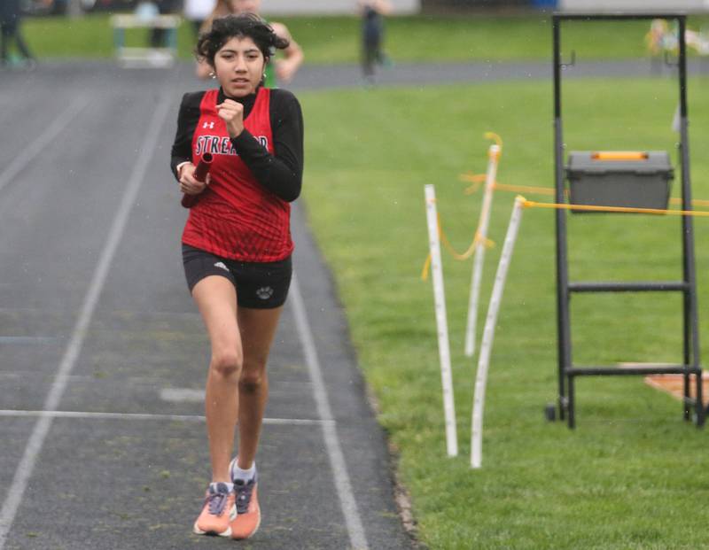 Streator's Gisell Guadaramma runs in the 4x800 meter relay during the Class 2A girls track and field Sectional on Thursday, May 9, 2024 in Princeton.