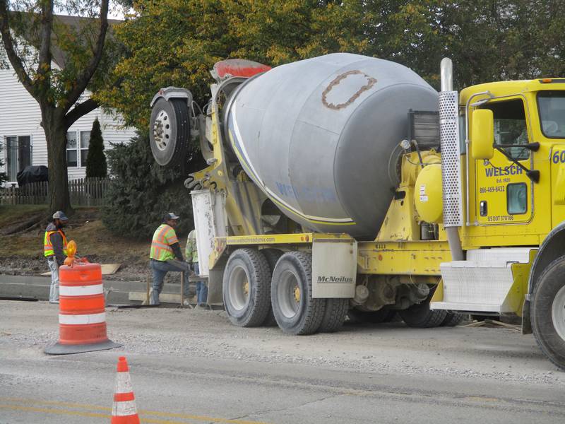 A construction crew works on the Theodore Street improvement project on the far West Side of Joliet on Monday, Oct. 14, 2024.