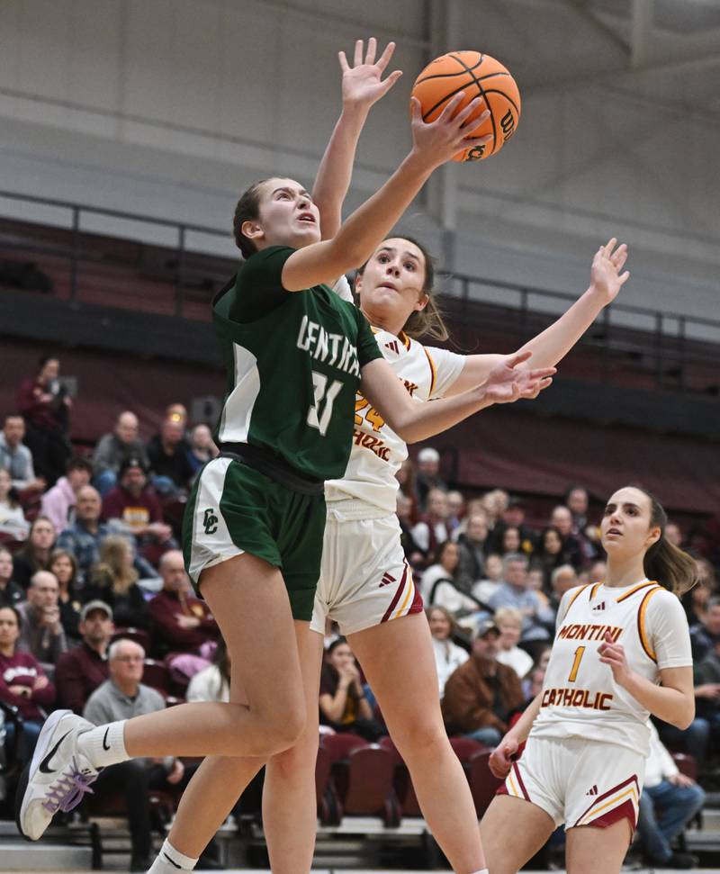 Grayslake Central's Peyton Hoffmann drives to the basket against Montini's Peyton Farrell during the Hersey Class 3A supersectional on Monday, March 3, 2025 in Arlington Heights.