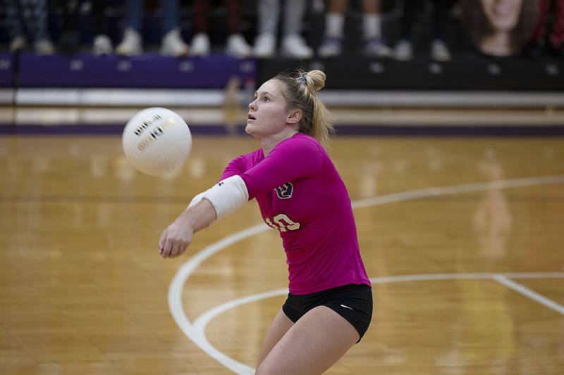 Dixon’s Natalie Davidson passes a shot Monday, Oct. 17, 2022 against Geneseo.