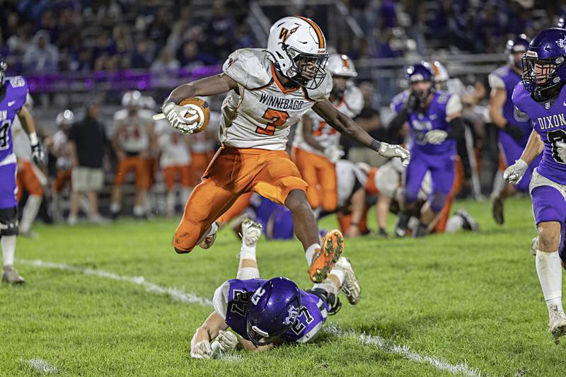 Winnebago’s Supreme Muhammad hurdles Dixon’s Eli Davidson Friday, Sept. 29, 2023 in Dixon.