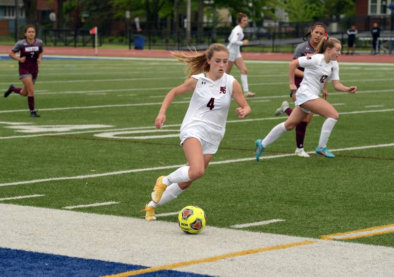 Hinsdale Central's Carter Knotts makes her way down field during the regional final game against Morton West  Saturday May 21, 2022.