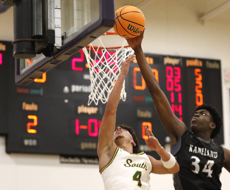 Kaneland's Jeffrey Hassan blocks the shot of Crystal Lake South's AJ Demirov during the IHSA Class 3A Rochelle Sectional championship basketball game on Friday, March 7, 2025, at Rochelle High School.