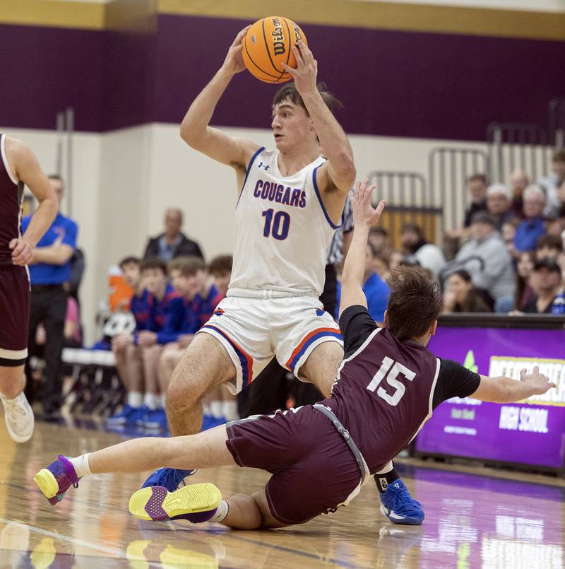 Eastland’s Zyacn Haverland looks to pass against Dakota’s Brody Keeney Wednesday, March 5, 2025, during the Class 1A boys basketball Sectional semifinal at Pecatonica High School.