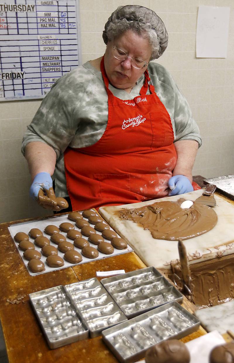 MaryBeth Tibbs makes Easter eggs on Thursday, March 27, 2025, at Anderson's Candy Shop in Richmond.