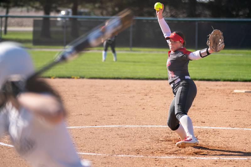 Ottawa’s Maura Condon (34) delivers a pitch against Kaneland during a softball game at Kaneland High School on Wednesday, April 26, 2023.