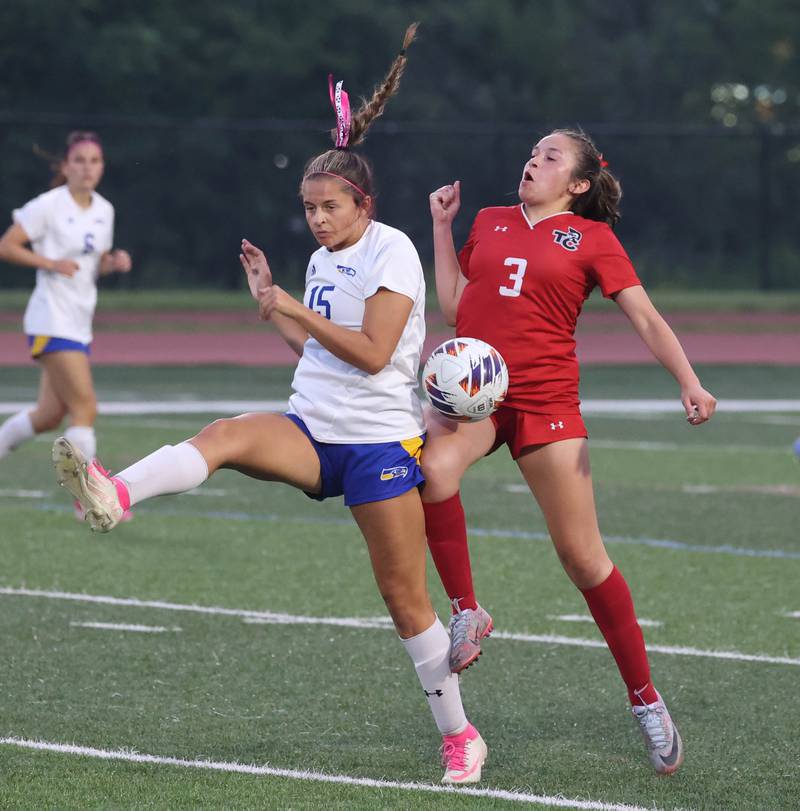 Johnsburg's Lauren McQuiston (left) and Timothy Christian's Kate Gagliano try to win possession Thursday, June 5, 2025, during their IHSA Class 1A state semifinal at North Central College in Naperville.