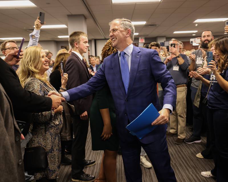 U.S. Rep. Sean Casten celebrates with supporters after defeating Orland Park Mayor Keith Pekau at Chicagoland Laborers' District Council in Burr Ridge, Ill. on Tuesday, Nov. 8, 2022.