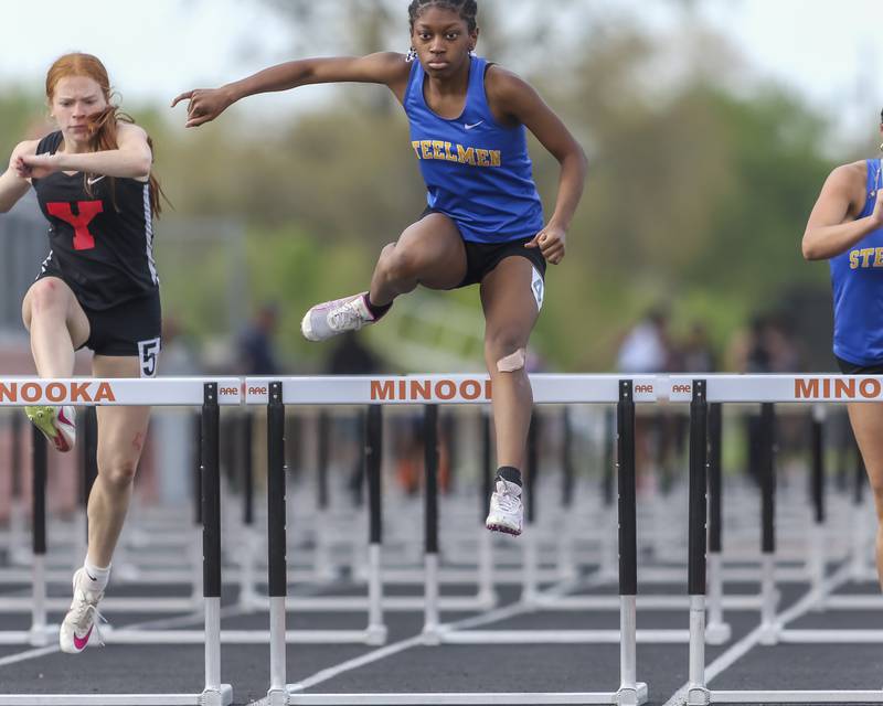 Joliet Central's Taya McGee (4) wins her heat during Southwest Prairie Conference Girls Track and Field Meet Wednesday, May 7, 2025 in Minooka.