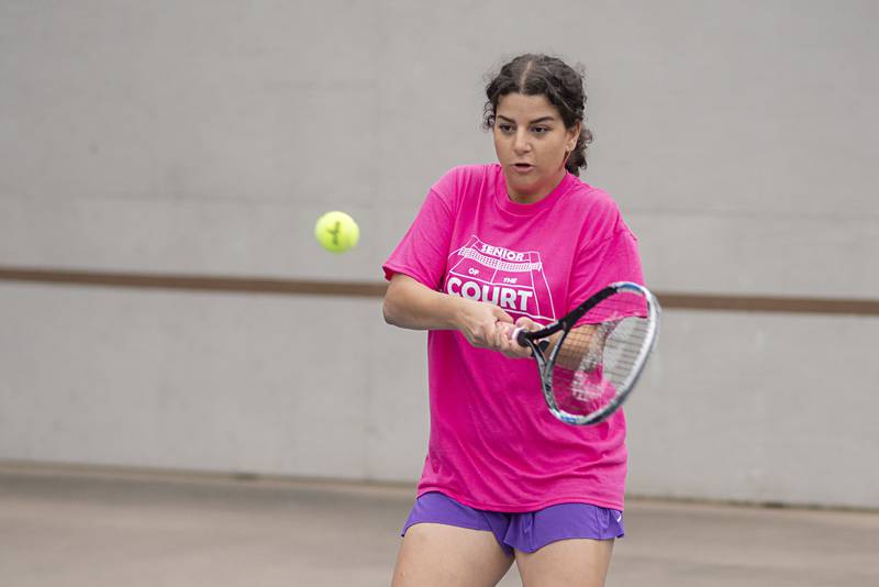 Dixon’s Nour Alsramah returns a shot while playing doubles against Newman Thursday, Oct. 6, 2022.