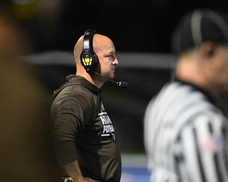 Joliet Catholic Academy Head Coach Jake Jaworksi looks on during the second quarter on Friday Sep. 22, 2023, while traveling to take on St. Francis High School in Wheaton.