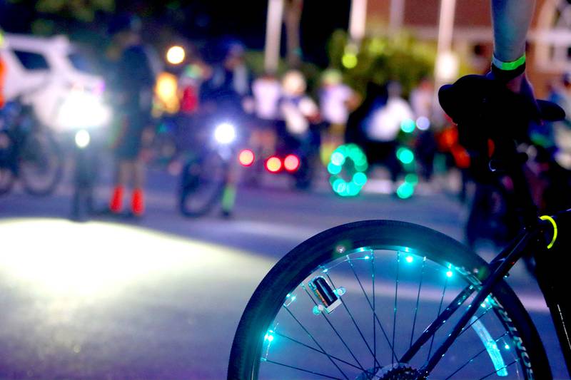 Lit bikes glow before the Raue Center for the Arts Night Owl Bike Ride in Crystal Lake on Saturday, August 2, 2025.