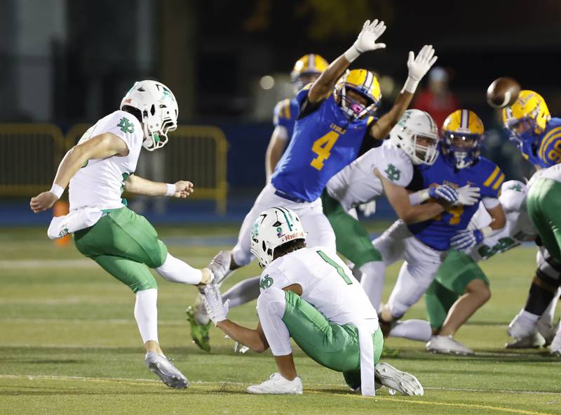 York's Jack O'Connor (33) attempts a field goal during the varsity football first-round 8A playoff game between York and Lyons Township on Friday, Oct. 31, 2025 in Western Springs, IL.