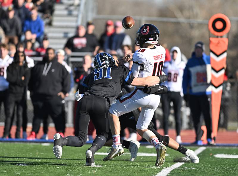 Lincoln-Way East's defensive end Caden O'Rourke pressures Barrington's quarterback Nick Peipert during the IHSA class 8A semifinals playoff game on Saturday, Nov. 18, 2023, at Frankfort. (Dean Reid for Shaw Local News Network)