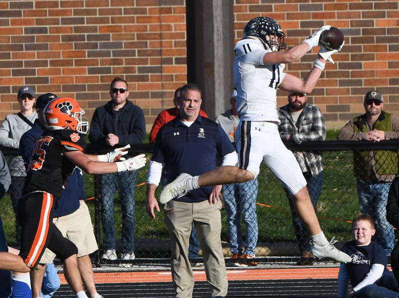Elmhurst IC Catholic's Grant Bowen (11) catches a pass against  Byron during 3A quarterfinals on Saturday, Nov. 15, 2025 at Byron High School.