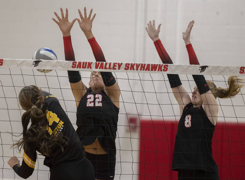Sauk Valley’s ReAnna Brant (left) and Madyson Tichler work for a block against Triton College Wednesday, Nov. 5, 2025, during the Regional IV tournament.