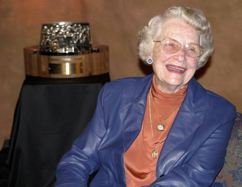 Chicago Bears owner Virginia Halas McCaskey, daughter of Bears founder George Halas, sits with the George Halas NFC Championship Trophy during a pool interview Wednesday, Jan. 24, 2007, in Chicago. Three days after her team's biggest victory in more than two decades, McCaskey thought about her father during the interview, the man most responsible for the storied franchise's legacy. She said she thought he'd be around (spiritually) to finish it all. (AP Photo/Dan Yuska, Pool)