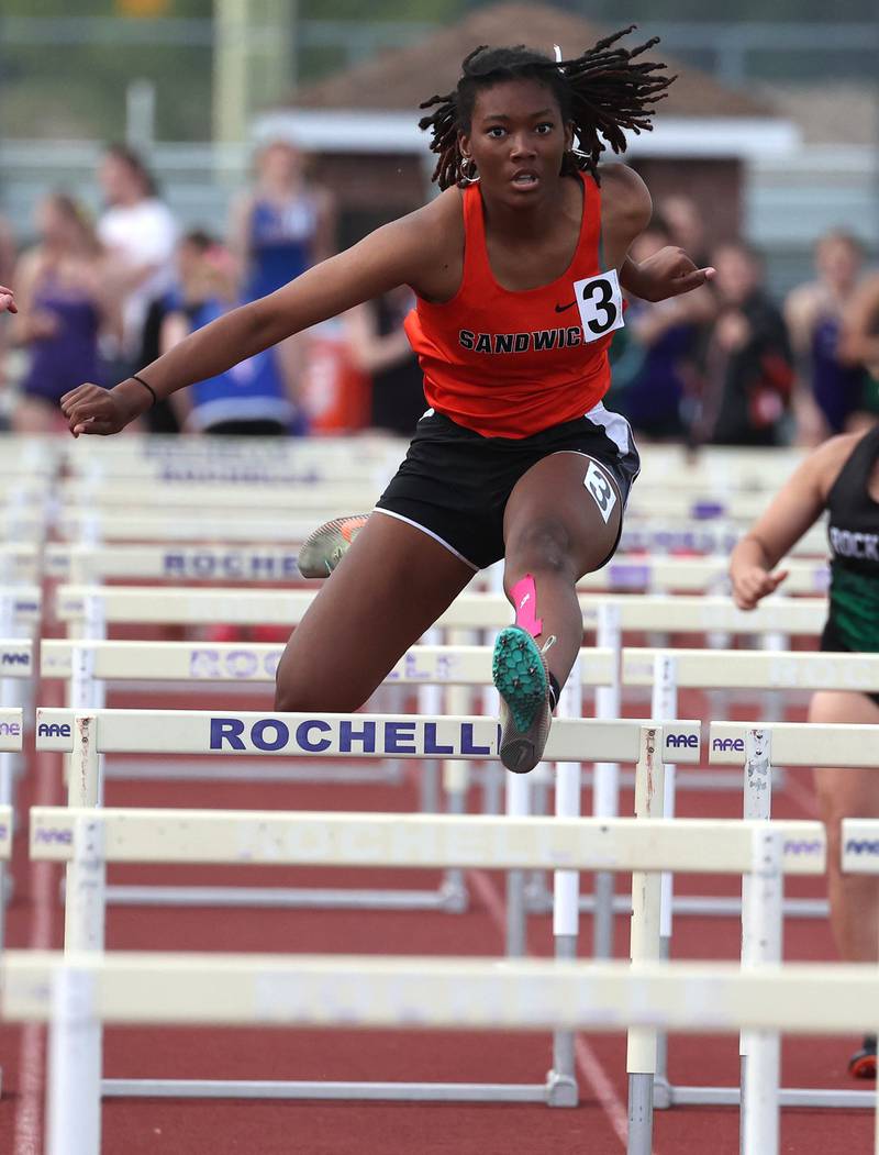 Sandwich’s Alayla Harris competes in the 100 meter hurdles Wednesday, May 8, 2024, during the girls track Class 2A sectional at Rochelle High School. Hernandez qualified for state.