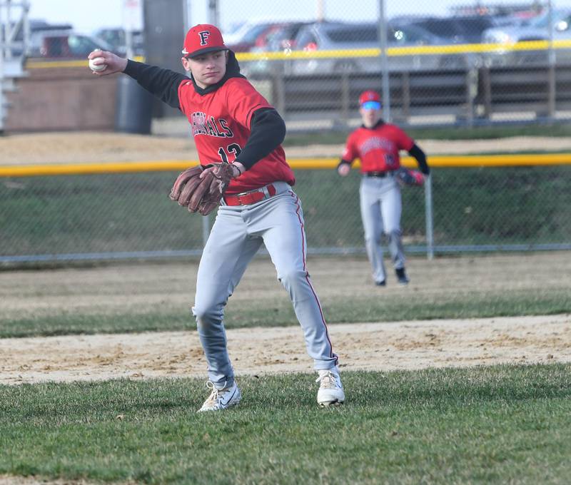 Forreston shortstop Kendall Erdmann gets ready to throw to first during a Wednesday, April 5 game with Sterling Newman.