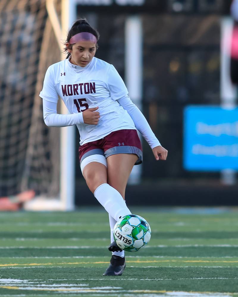 Morton's Brianna Avalos (15) kicks the ball during soccer match between Morton at Willowbrook. April 14, 2022.