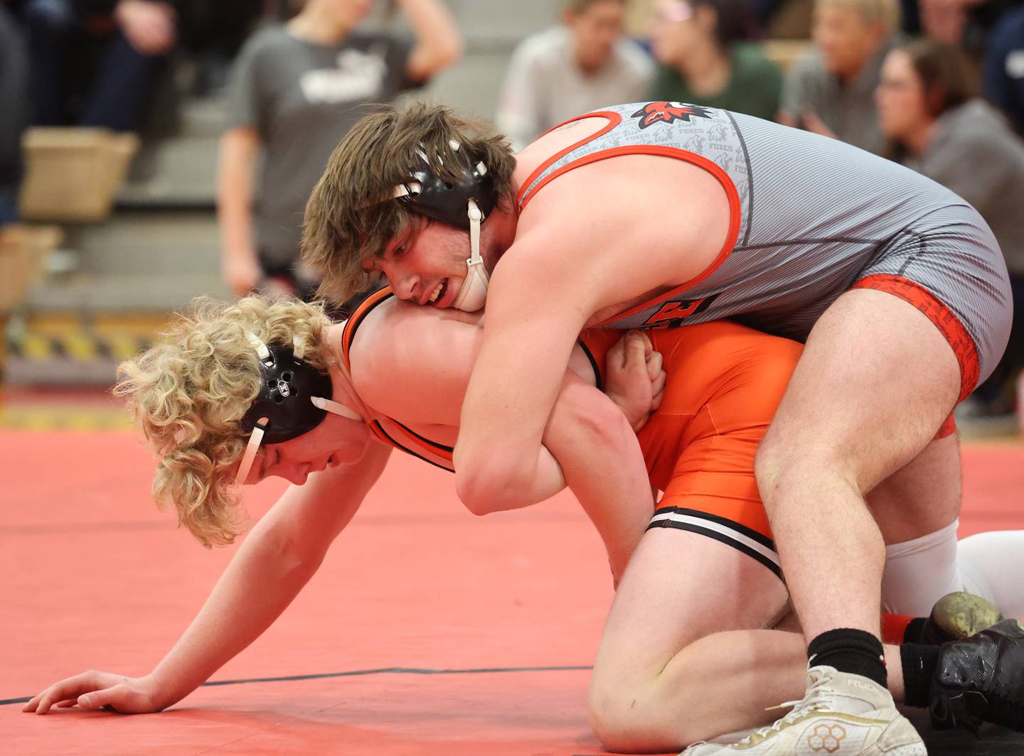 Minooka's Hunter Coons wrestles Yorkville's Hunter Janeczko, in grey, during the Southwest Prairie Conference wrestling meet at Yorkville High School on Saturday, Jan. 21, 2023.