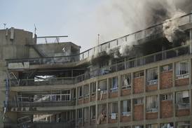 Israel threatens Iran’s top leader after missiles damage hospital and wound more than 200