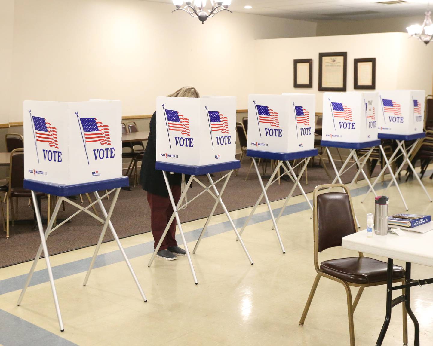 A single voter votes in a voting booth at the Moose Lodge on Tuesday, April. 4, 2023 in Princeton.