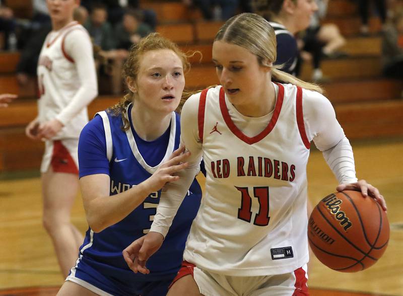 Woodstock's Keira Bogott guards Huntley's Anna Campanelli during the girl’s game of McHenry County Area All-Star Basketball Extravaganza on Sunday, April 13, 2025, at Alden-Hebron’s Tigard Gymnasium in Hebron.