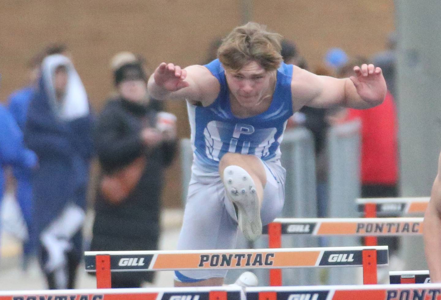Princeton's Casey Etheridge competes in the 100 meter hurdles during the Class 2A Sectional meet on Wednesday, May 21, 2025 at Pontiac High School.