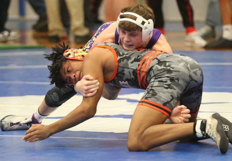 Mendota's Komen Denault wrestles Kewanee's Dontel Wommack during the Class 1A Regional meet on Saturday, Jan. 31, 2026 at Princeton High School.