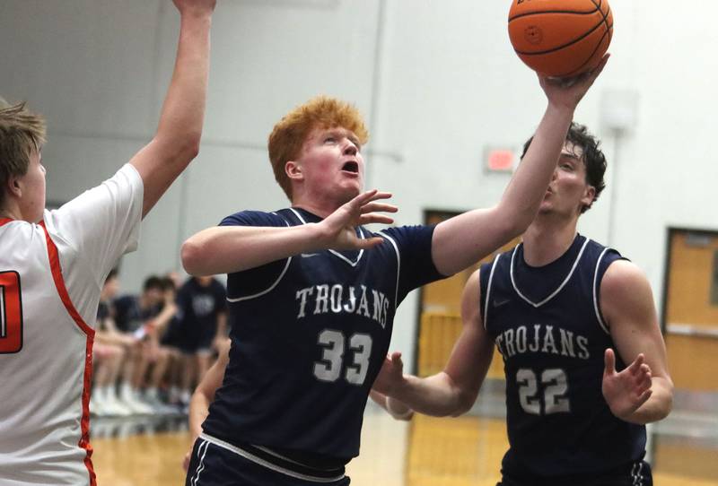 Cary-Grove’s Jack Berndt works under the hoop in varsity boys basketball on Tuesday, Feb. 17, 2026, at McHenry High School in McHenry.