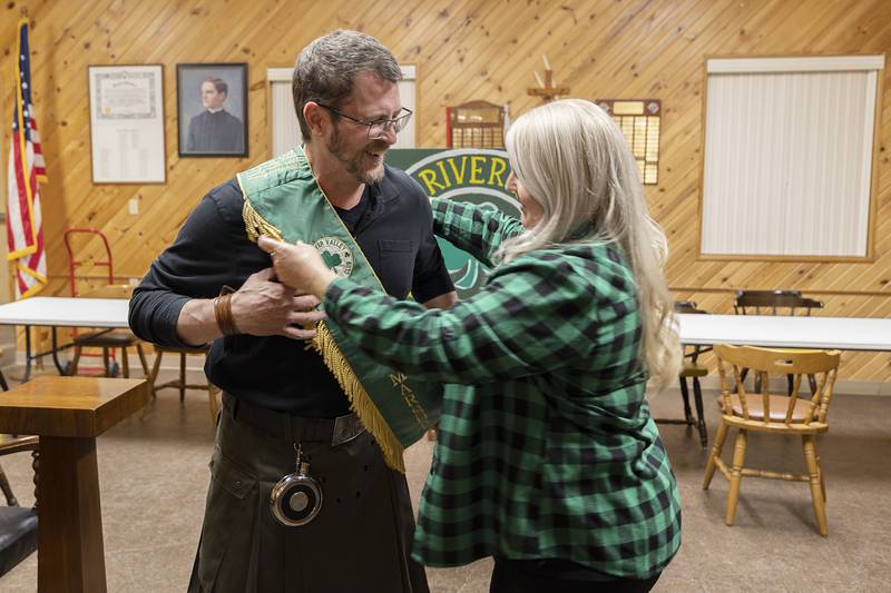 Dana Hoffman, High Chieftess of the Rock River Valley Shamrock Club, sashes Luke Dixon as the 2023 Grand Marshal of this year’s celebration Tuesday, Feb. 21, 2023 in Dixon.