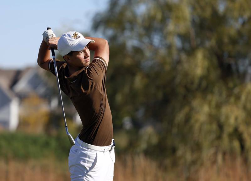 Aidan Soukup of Carmel Catholic tees off at the IHSA Class 2A Kaneland boys golf sectional  Monday, Oct. 7, 2024 at at Hughes Creek in Elburn.