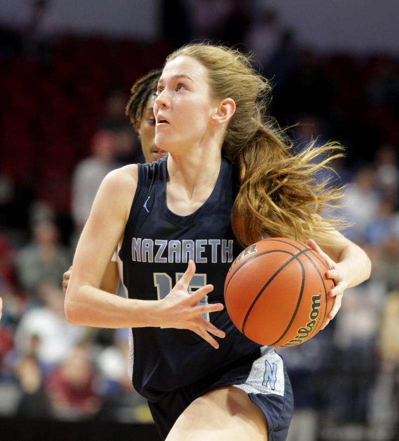 Nazareth Academy's Mary Bridget Wilson drives toward the basket during the Class 3A girls basketball state semifinal against Peoria at Redbird Arena in Normal on Friday, March 3, 2023.
