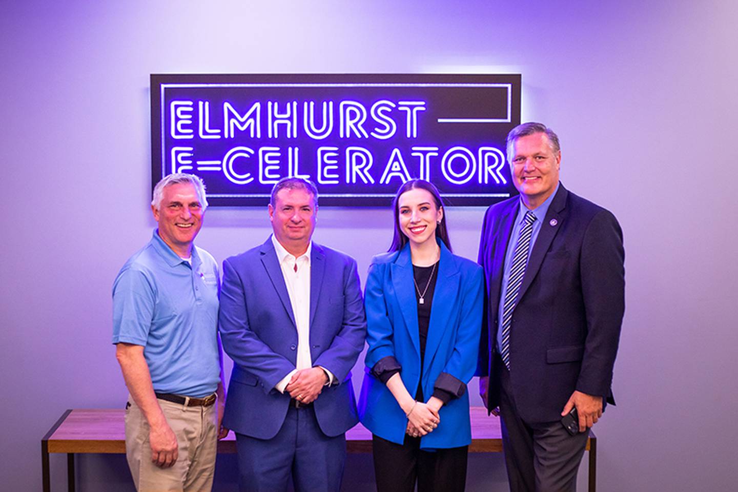 Attendees at the grand opening for the E-celerator Innovation Space include (from left) Martin Gahbauer, executive director of the Weigand Center for Professional Excellence; Entrepreneur in Residence Patrick Yanahan; student Jessica Pavliukovecas; and Elmhurst University. President Troy D. VanAken.
