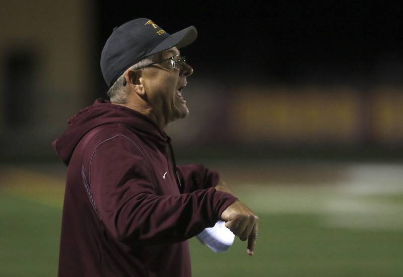 Richmond-Burton Head Coach Mike Noll argues a call with a referee during a Kishwaukee River Conference football game against Sandwich on Friday, Oct. 4, 2024, at Richmond-Burton High School.