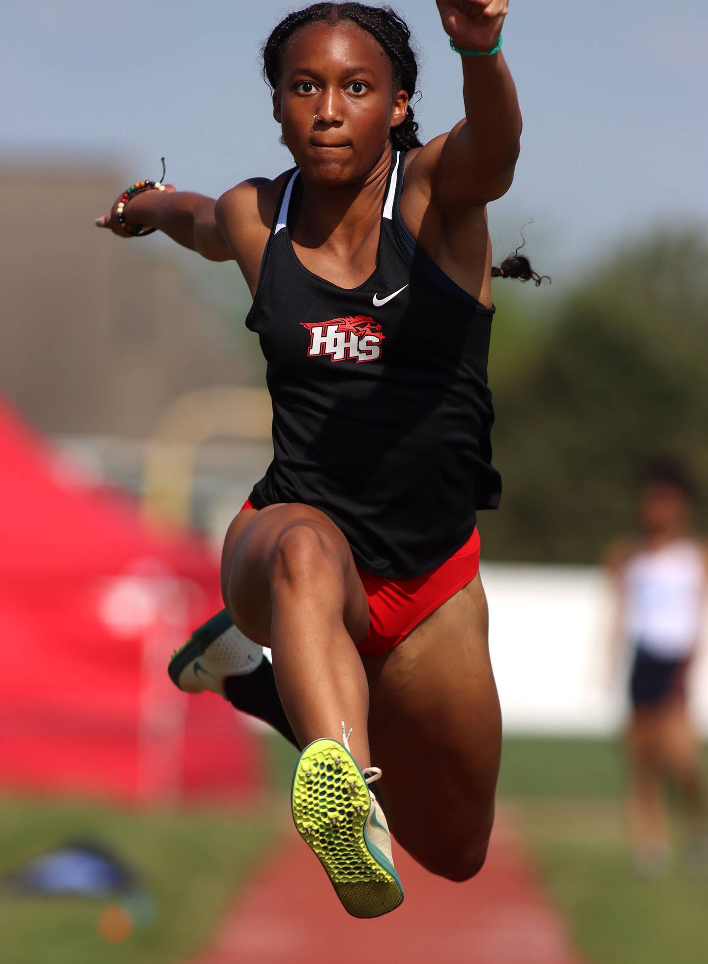 Huntley’s Dominique Johnson competes in the triple jump in IHSA Class 3A Girls Sectional Track and Field Meet action at Red Raider Stadium on the campus of Huntley High School in Huntley on Wednesday, May 14, 2025.