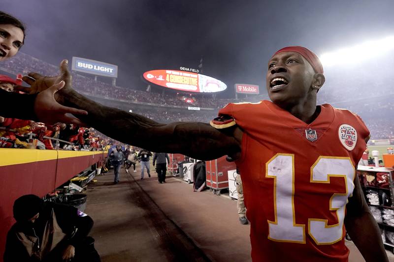 Former Kansas City Chiefs wide receiver Byron Pringle celebrates with fans after a playoff game against the Buffalo Bills, Sunday, Jan. 23, 2022, in Kansas City, Mo.