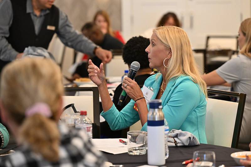 Sen. Sue Rezin, R-Morris, asks a question during the conference.
