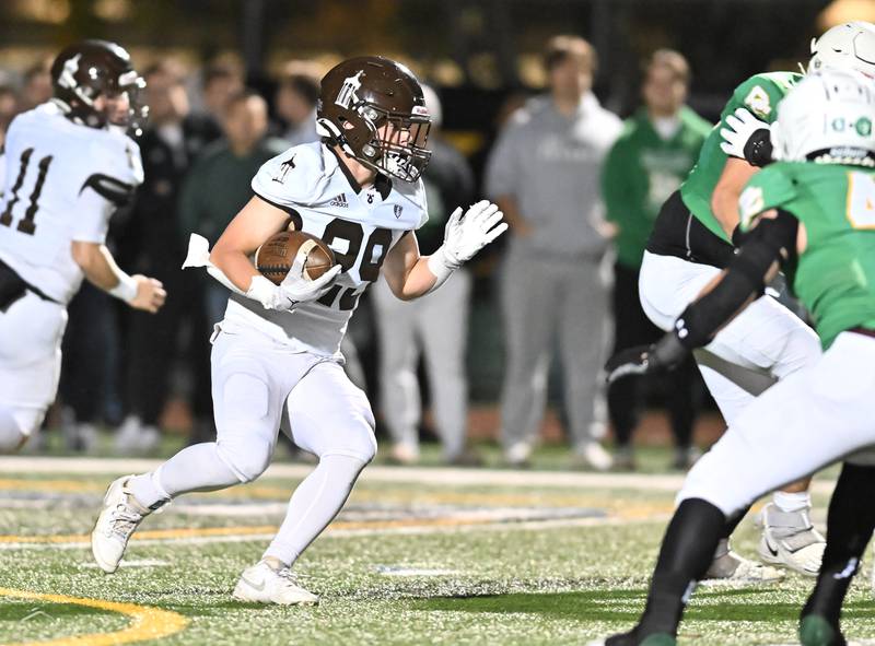 Joliet Catholic's running back Keegan Farnaus  in action during a conference game against Providence Catholic on Friday, Oct 25, 2024 at New Lenox. (Dean Reid for Shaw Local News)
