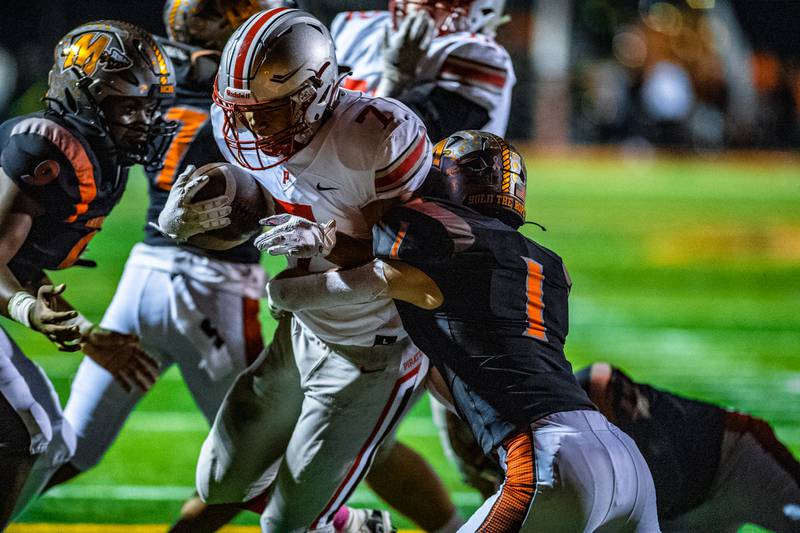 Palatines Dominick Ball runs in a touchdown during the 2nd round IHSA Class 8A playoff game against Minooka  Friday Nov. 4, 2022 at Minooka High School